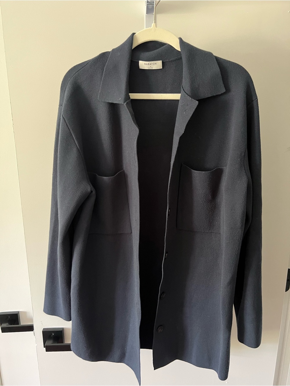 Babaton Navy sweater jacket from Aritzia.